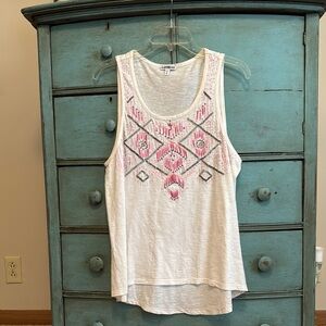 Express woman’s white with pink detail tank top.